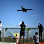 Buzz and tension as UK crowds watch US bombers head to war